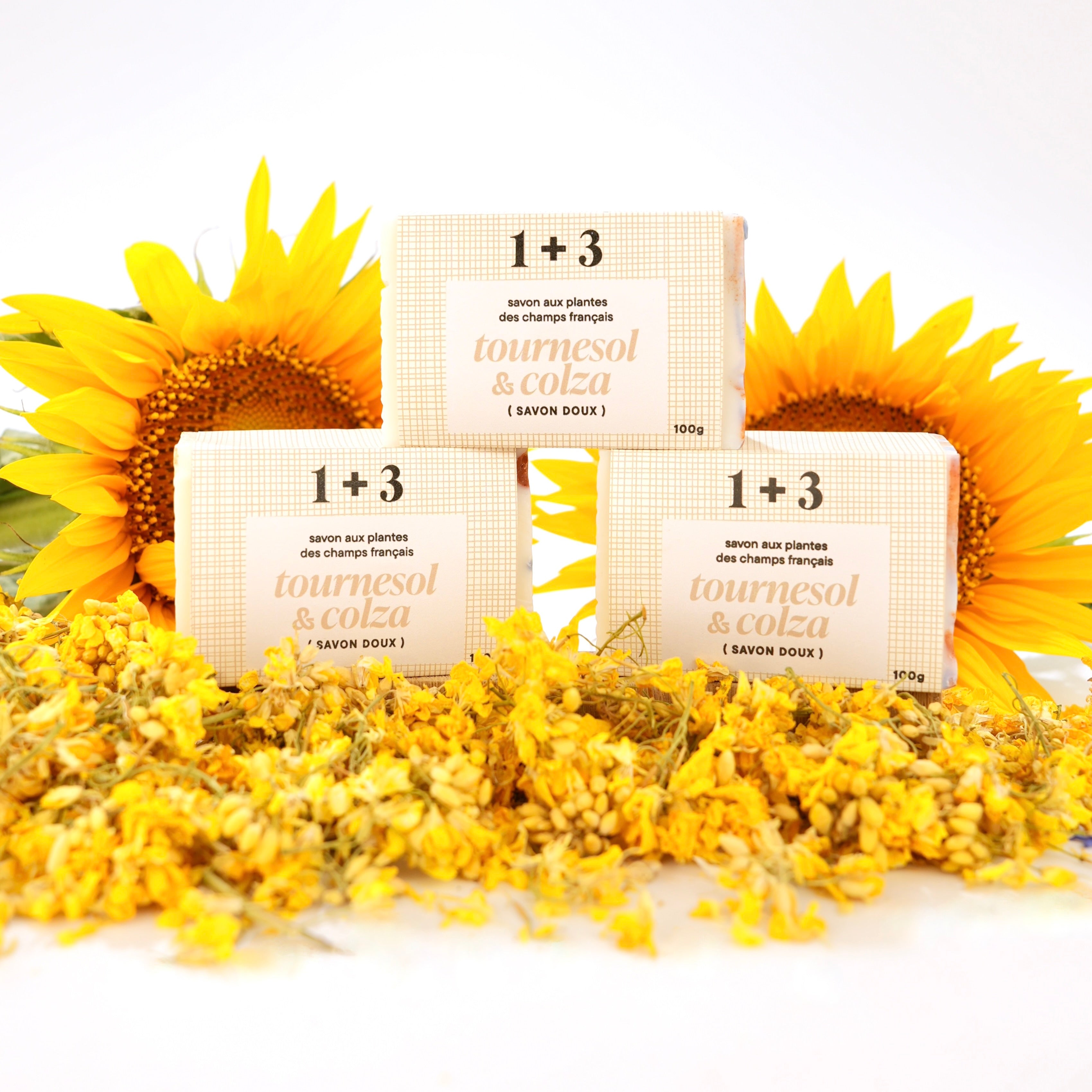 Savon de tournesol & colza 1+3 - fond avec fleurs de tournesol et fleurs séchées de colza 