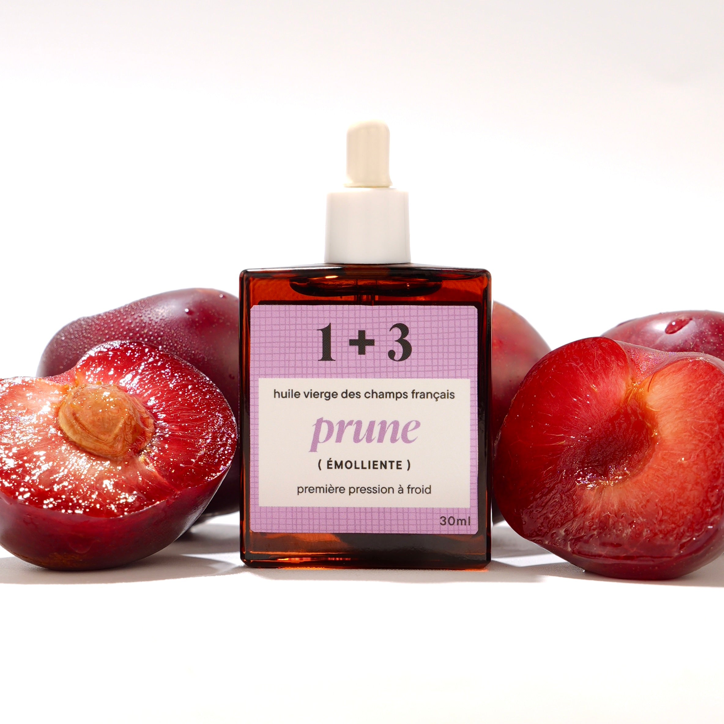 Huile de prune française 1+3 30 ml – Fond avec des prunes 